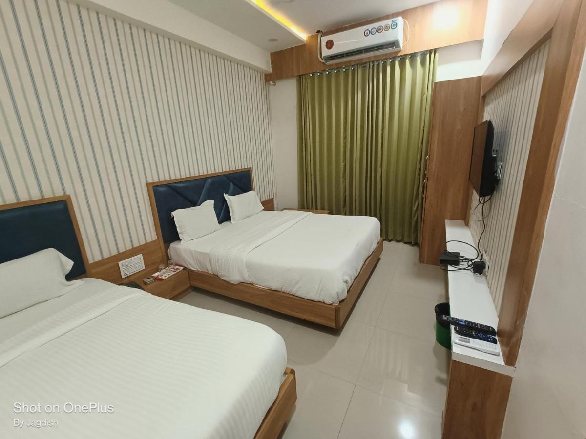 Hotel Asopalav Gandhinagar Bagian luar foto