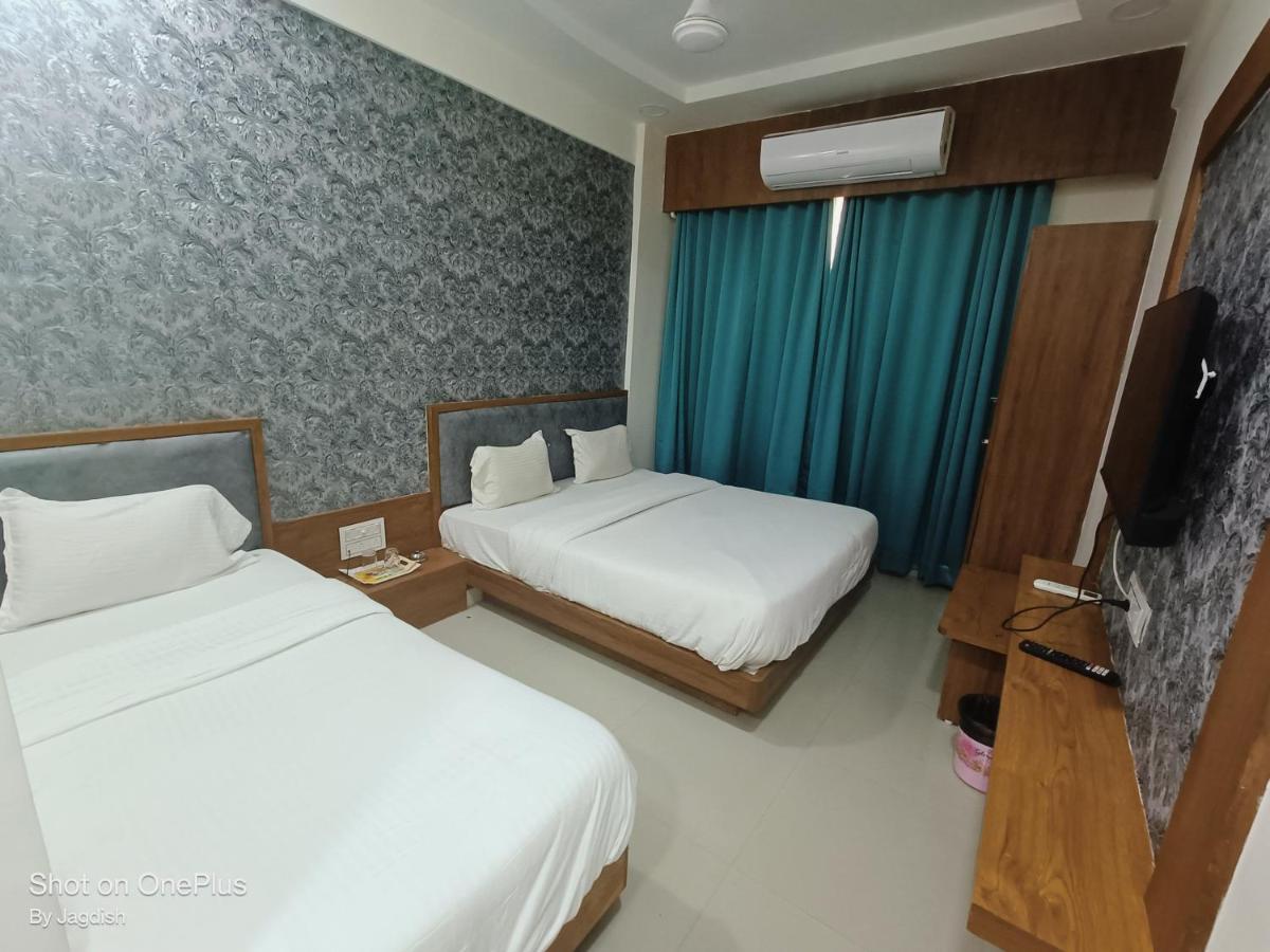 Hotel Asopalav Gandhinagar Bagian luar foto